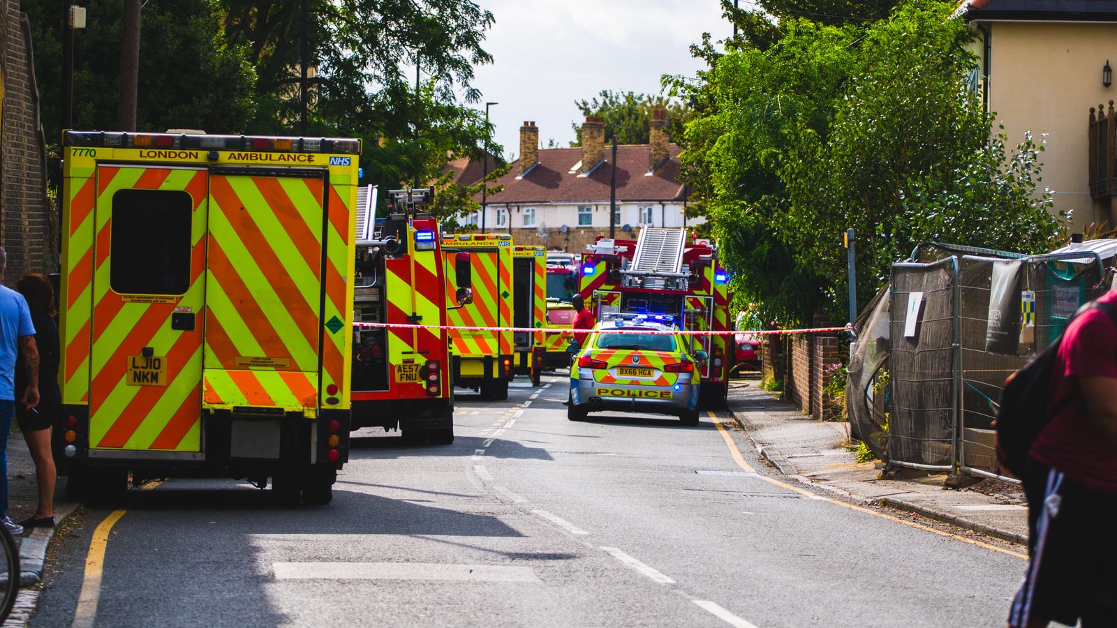 UK police, ambulance and fire crews responding on a London street